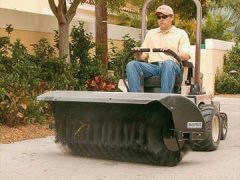 Grasshopper with CleanSweep Rotary Brooms in action